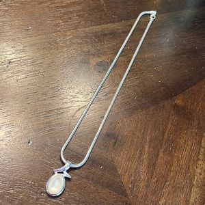 silver necklace with white pearl